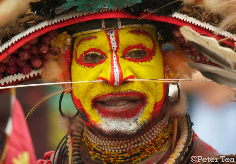 Closeup of Huri Huna dancer with face paint.